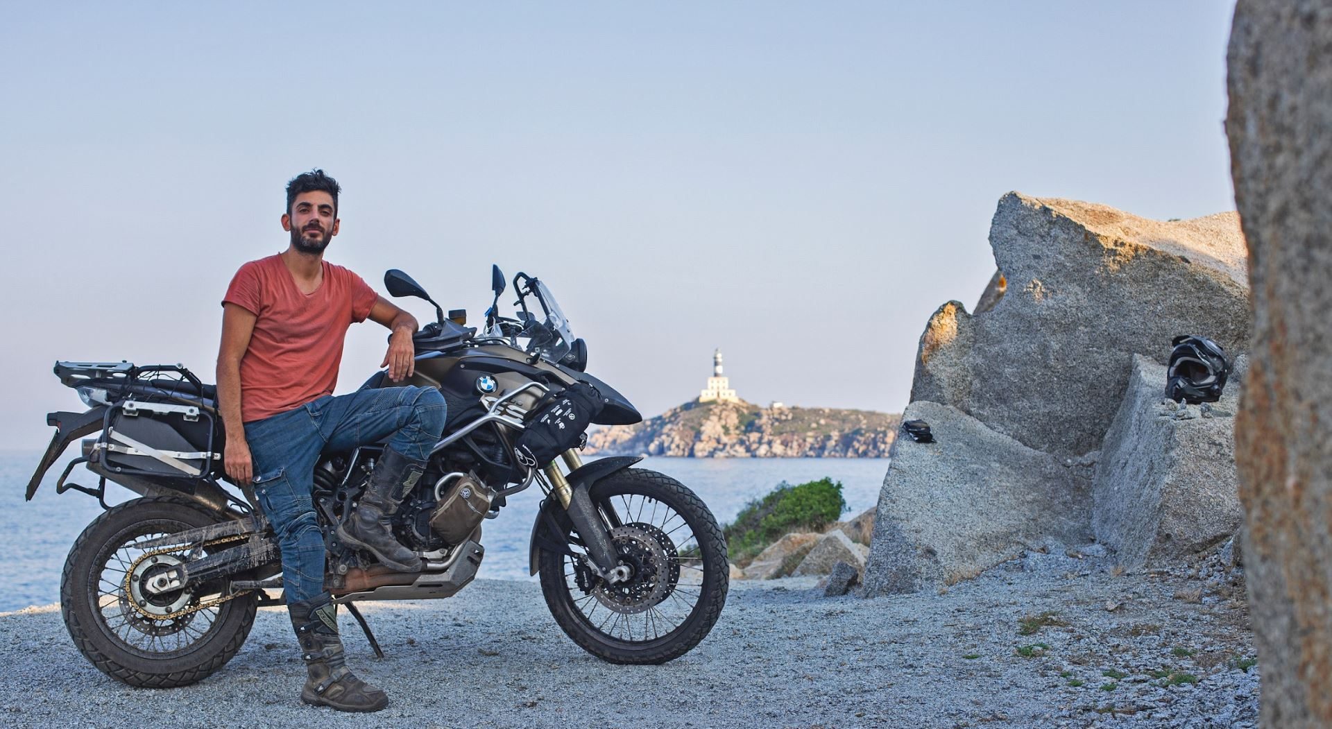 Alessio and his BMW motorcycle on the Sardinian coast